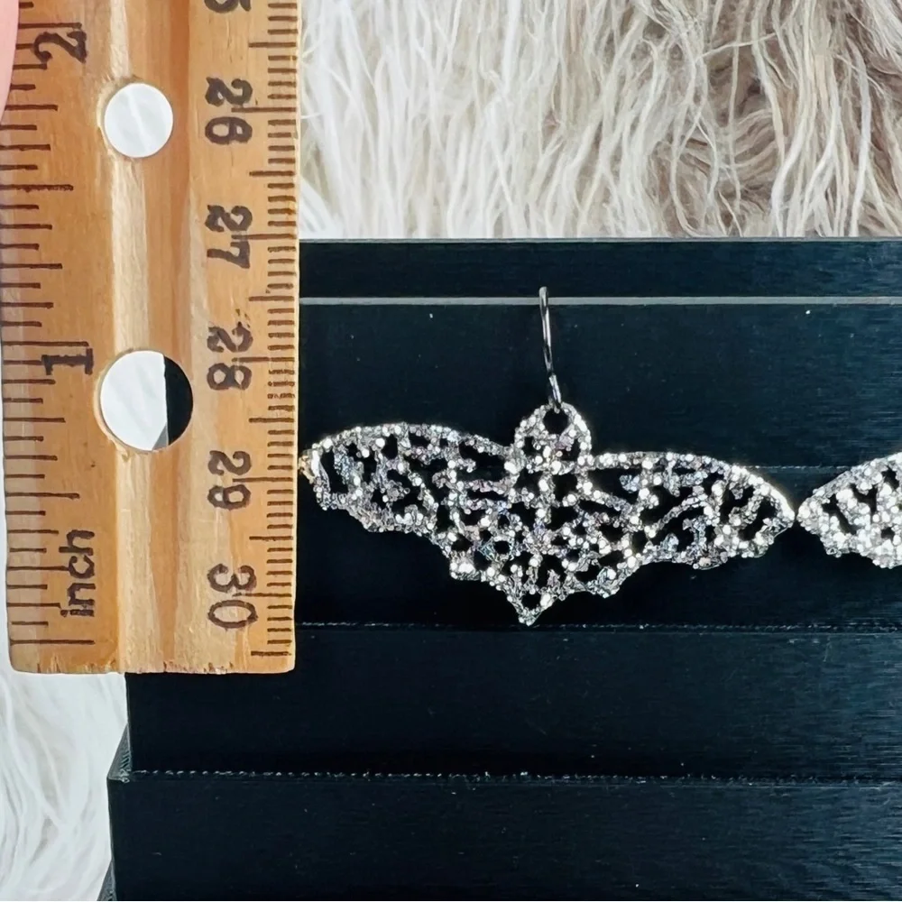 Pretty Silvertone bling bat costume pierced earrings